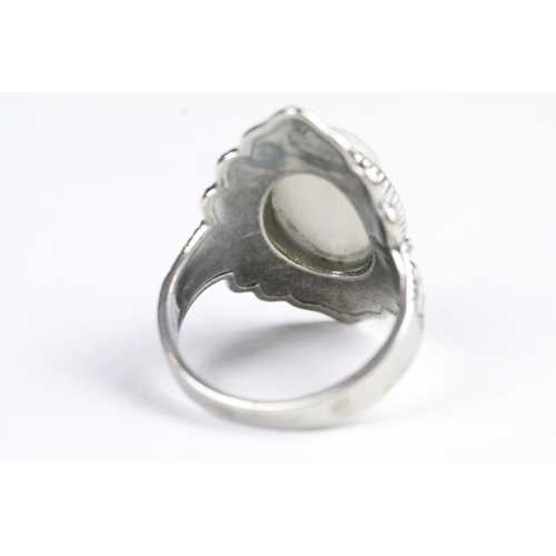 233 - Silver and moonstone dress ring set with an oval cabochon to centre. Marked 925. Size P.5.