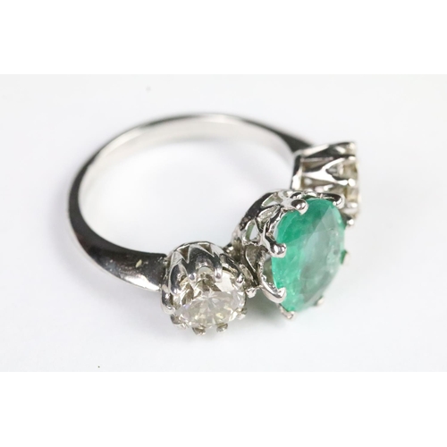 241 - Emerald and diamond three stone ring set in 18ct white gold