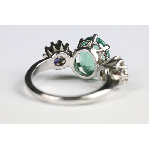 241 - Emerald and diamond three stone ring set in 18ct white gold