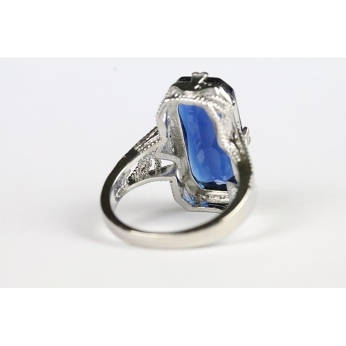 242 - Silver ring, with blue stone, stamped S925