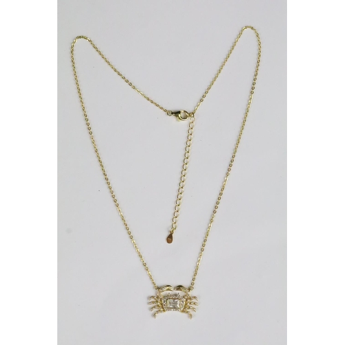 257 - Silver and gold gilt necklace and diamante crab pendant