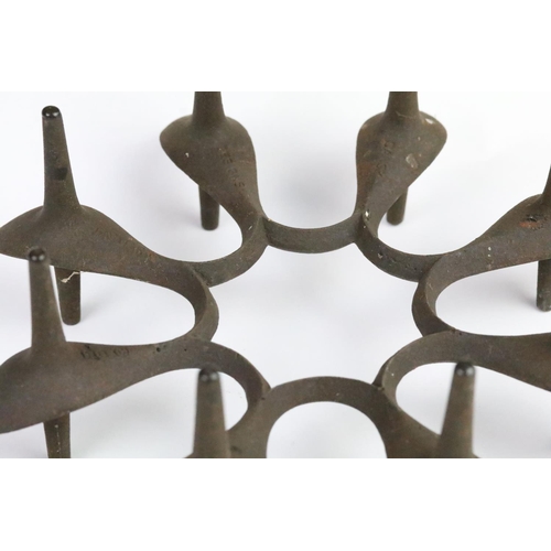 262 - Two Dansk Designs cast iron modernist candleholders. Each marked Dansk Designs Denmark to the bases.... 