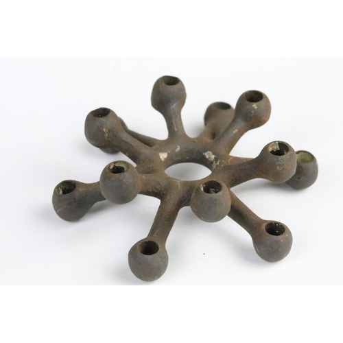 262 - Two Dansk Designs cast iron modernist candleholders. Each marked Dansk Designs Denmark to the bases.... 