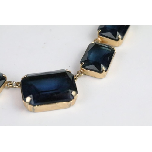 264 - Vintage mid Century riviere necklace set with blue stones.