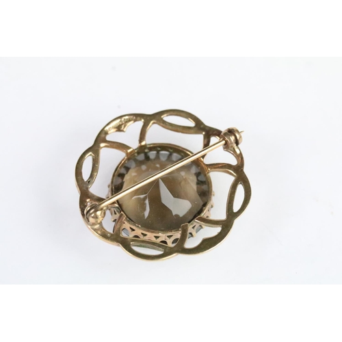 279A - 9ct gold and smoky quartz brooch (hallmarked Birmingham 1965), an Ernest Blith for Ivan Tarratt silv... 