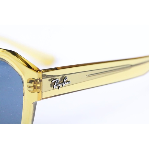 313 - Pair of original boxed Ray Ban 'Corrigan' sunglasses in transparent yellow with dark blue lenses, co... 