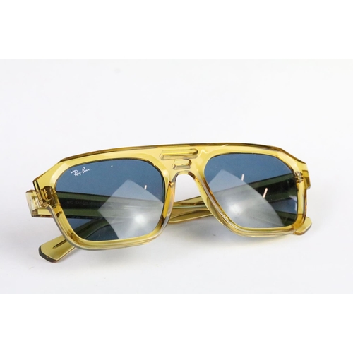 313 - Pair of original boxed Ray Ban 'Corrigan' sunglasses in transparent yellow with dark blue lenses, co... 