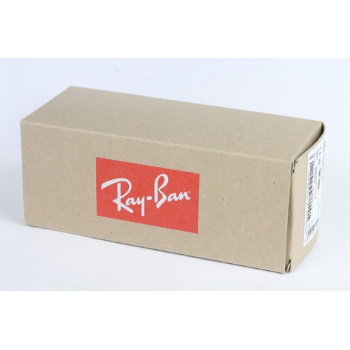 313 - Pair of original boxed Ray Ban 'Corrigan' sunglasses in transparent yellow with dark blue lenses, co... 