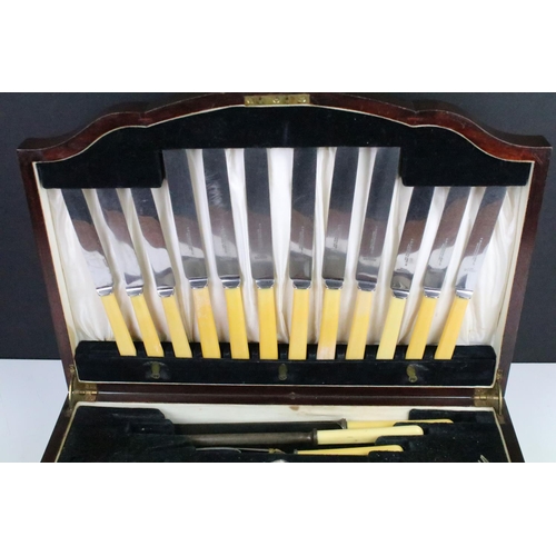 314 - Early 20th Century silver plated cutlery canteen set within wooden presentation case. Measures 44cm ... 