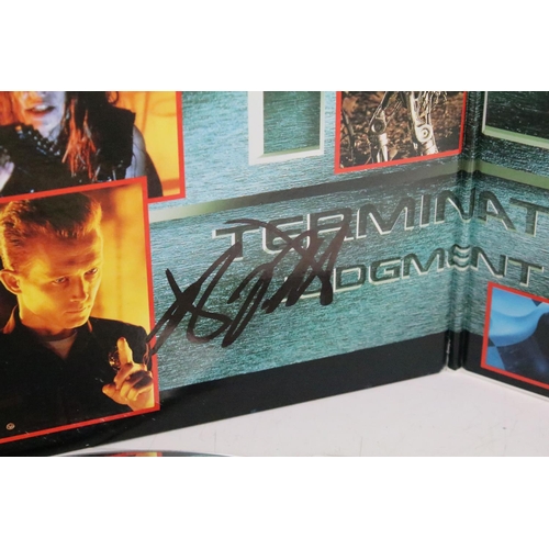 316 - Signed Terminator 2 Judgement Day laser disc LP record. The record signed twice by Arnold Schwarzneg... 