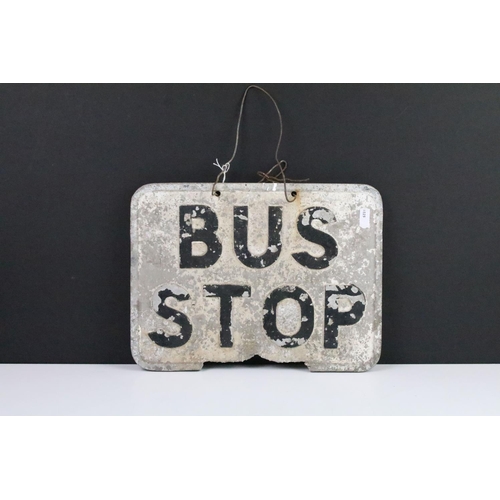 104 - Cast metal double sided hanging bus stop sign (approx 30cm W x 23cm H)