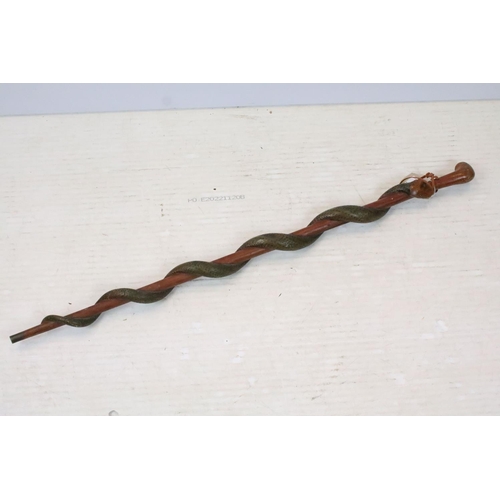 186 - Wooden walking stick with carved snake detailing modelled wrapped around the shaft, together with an... 