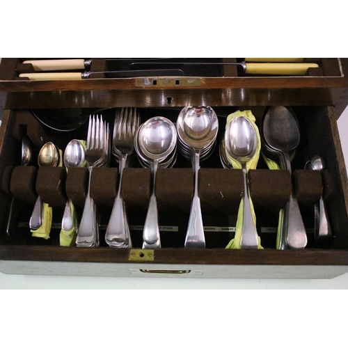 139 - Twelve setting Old English pattern canteen of silver plated cutlery, housed within an oak cutlery bo... 