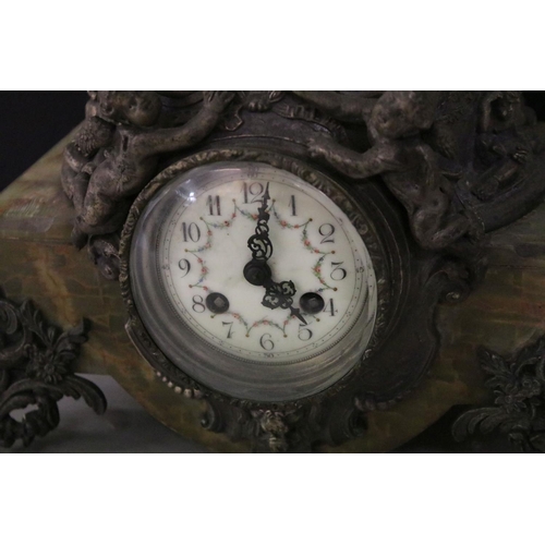 155 - Large late 19th century French onyx & spelter mantel clock surmounted by two putti, with plaque insc... 