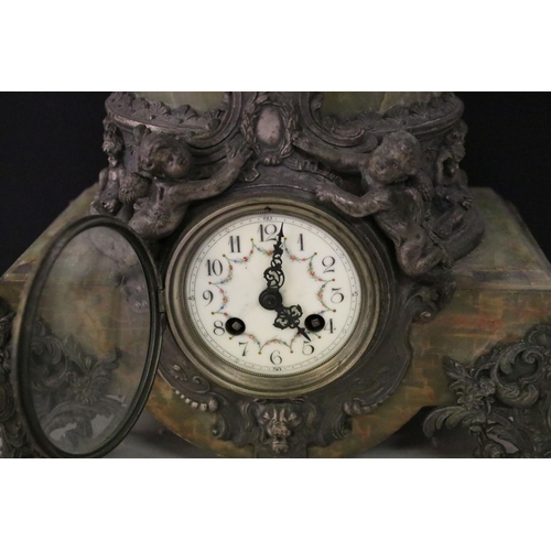 155 - Large late 19th century French onyx & spelter mantel clock surmounted by two putti, with plaque insc... 