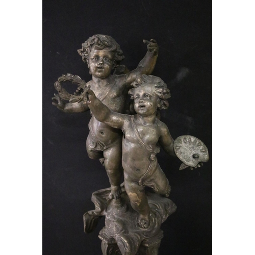 155 - Large late 19th century French onyx & spelter mantel clock surmounted by two putti, with plaque insc... 