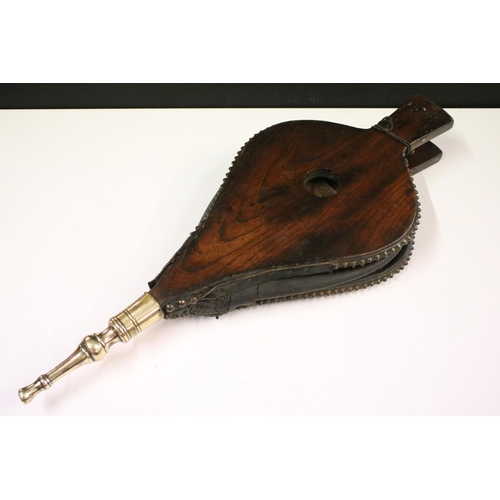 653 - Eastern hardwood heart-shaped carved wooden bellows, carved with central peacock and leaves verso 73... 