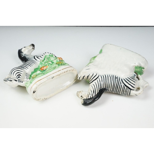 14 - Pair of 19th Century Staffordshire pottery zebras, approx 16.5cm tall