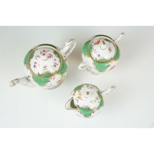 17 - Continental porcelain cabaret coffee set with hand painted floral decoration, comprising coffee pot,... 