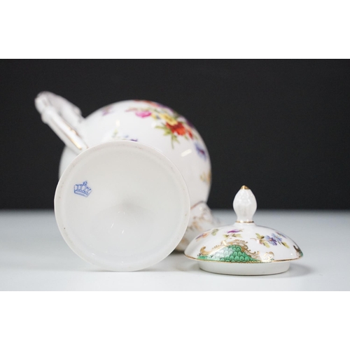 17 - Continental porcelain cabaret coffee set with hand painted floral decoration, comprising coffee pot,... 