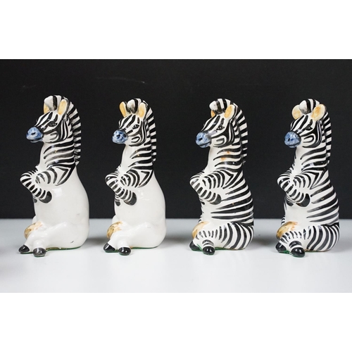 18 - Giuseppe Ronzan - A set of hand painted jungle animal ceramic chess pieces, circa 1968, ltd edn of 2... 