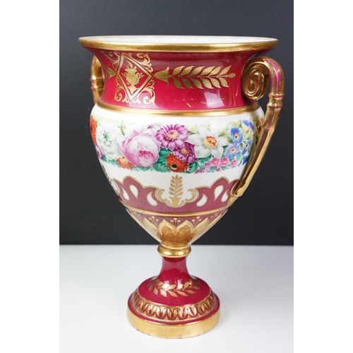 20 - 19th Century continental twin handled urn vase with floral decoration on a pink ground, with gilt de... 