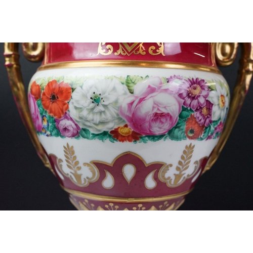 20 - 19th Century continental twin handled urn vase with floral decoration on a pink ground, with gilt de... 