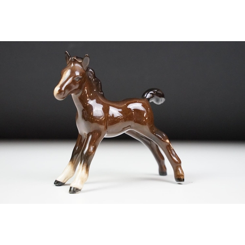 27 - Beswick - A porcelain figure of a Lipizzaner horse and rider, marked to base and numbered 53, approx... 