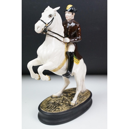 27 - Beswick - A porcelain figure of a Lipizzaner horse and rider, marked to base and numbered 53, approx... 