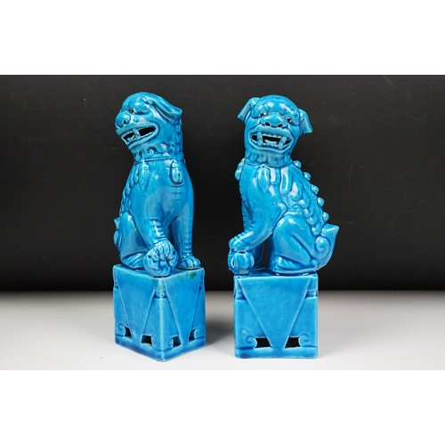 29 - Two pairs of blue glazed Chinese Foo Dogs (tallest approx 21cm), together with a further pair of car... 