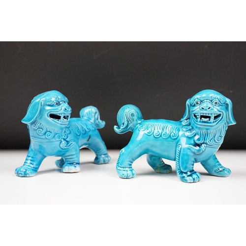 29 - Two pairs of blue glazed Chinese Foo Dogs (tallest approx 21cm), together with a further pair of car... 