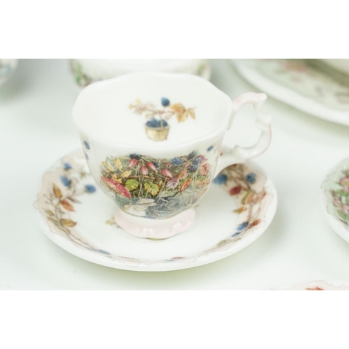 31 - Royal Doulton Brambly Hedge miniature tea ware to include teapot, 4 teacups & saucers, 3 tea plates,... 