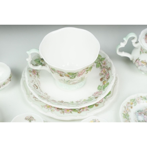 31 - Royal Doulton Brambly Hedge miniature tea ware to include teapot, 4 teacups & saucers, 3 tea plates,... 