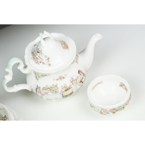 31 - Royal Doulton Brambly Hedge miniature tea ware to include teapot, 4 teacups & saucers, 3 tea plates,... 