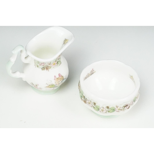 31 - Royal Doulton Brambly Hedge miniature tea ware to include teapot, 4 teacups & saucers, 3 tea plates,... 