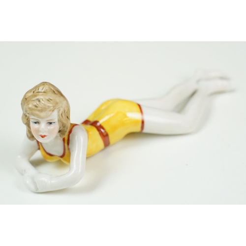 39 - Two Nao porcelain figurines to include 1450 Truly In Love (approx 25cm tall), together with a USSR p... 