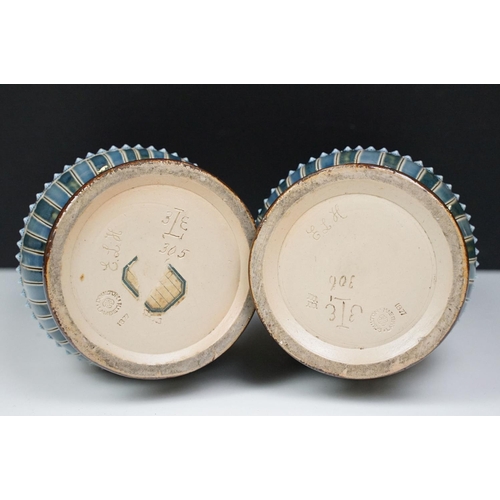 40 - Near pair of late 19th century Doulton Lambeth stoneware vases with incised foliate decoration, inci... 