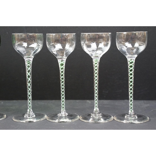 42A - Set of helix twist stemmed sherry glasses to include five green bowl glasses and four with clear bow... 