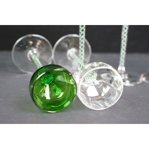 42A - Set of helix twist stemmed sherry glasses to include five green bowl glasses and four with clear bow... 