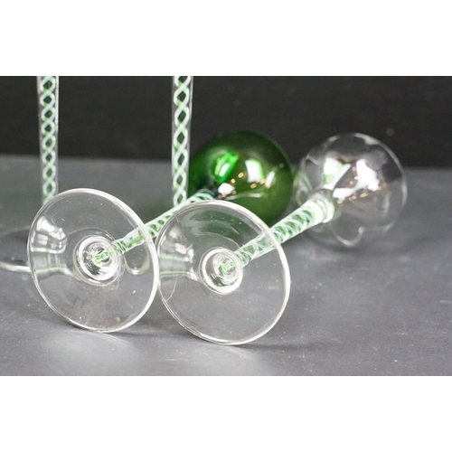 42A - Set of helix twist stemmed sherry glasses to include five green bowl glasses and four with clear bow... 