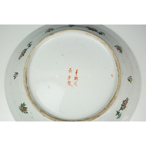 51 - Early 20th Century Chinese Canton famille rose charger plate featuring garden scenes and foliate det... 