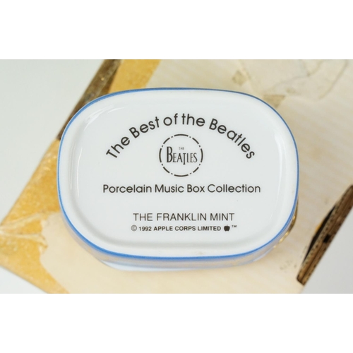 52 - Set of six Franklin Mint Best of the Beatles porcelain music box collection. All in packaging.