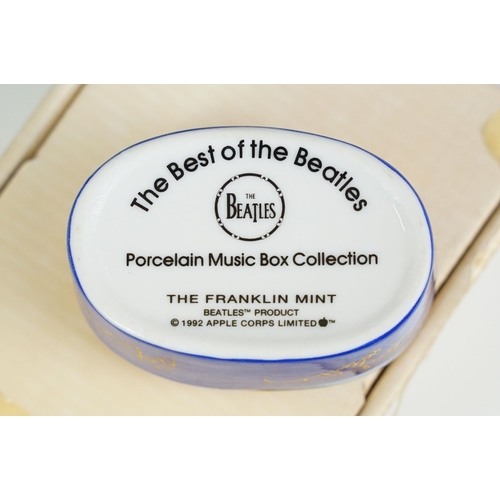 52 - Set of six Franklin Mint Best of the Beatles porcelain music box collection. All in packaging.