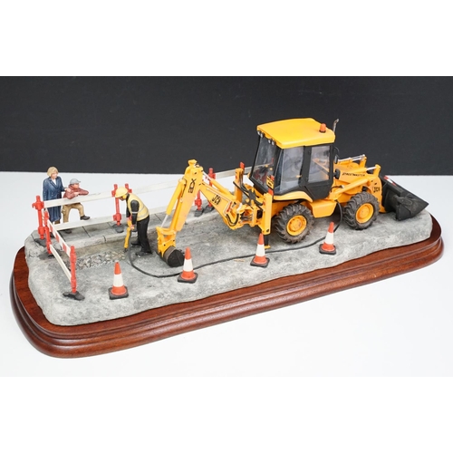 62 - Border Fine Arts limited edition figurine 'Essential Repairs' (no. 1519 of 1750) and a JCB Collectab... 