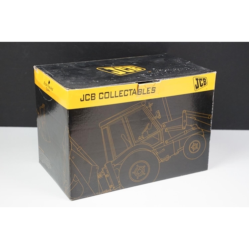 62 - Border Fine Arts limited edition figurine 'Essential Repairs' (no. 1519 of 1750) and a JCB Collectab... 