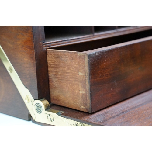 147 - Victorian mahogany stationery cabinet, the fall front door opening to six storage compartments with ... 