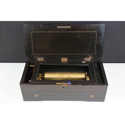 150 - 19th Century Swiss cylinder music box, the marquetry inlaid lid opening to a brass cylinder (approx ... 