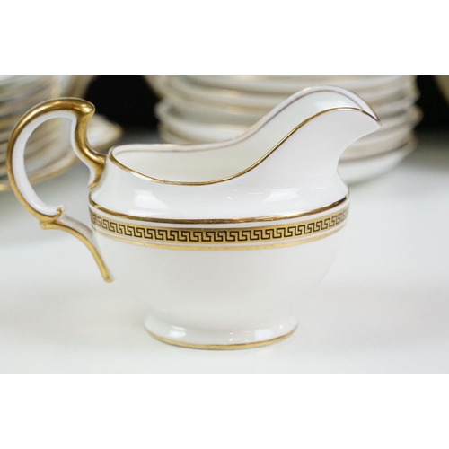 74 - Aynsley tea service having gilt rims with greek key detailing to include seven tea cups, ten saucers... 