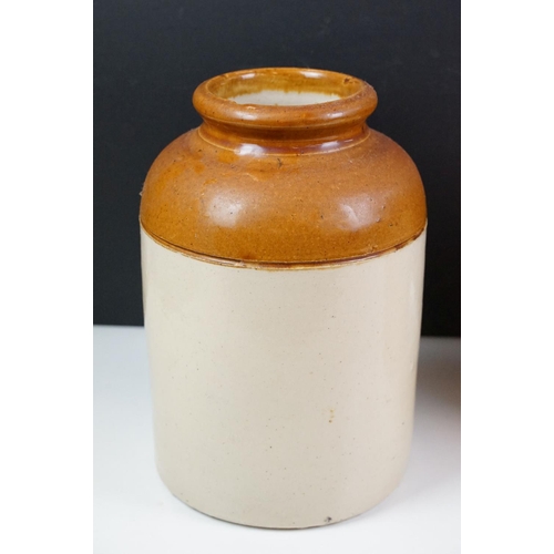 77 - Three Victorian stoneware jars to include one twin handled example. Measures 28cm.