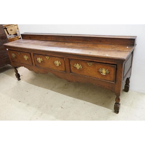 637 - 18th century oak sideboard, the galleried back with lip and three drawers above carved apron, 78cm h... 